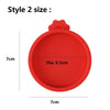 Red silicone reusable food storage lid with a diameter of 6.5cm and a height of 7cm.