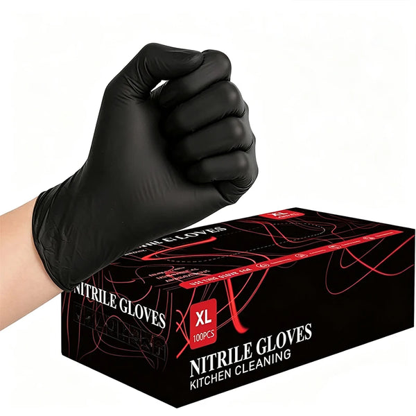 A hand wearing a black nitrile disposable glove is shown holding a box of nitrile gloves for kitchen cleaning.