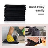 A stack of black reusable microfiber cleaning cloths is shown next to hands demonstrating their easy use.