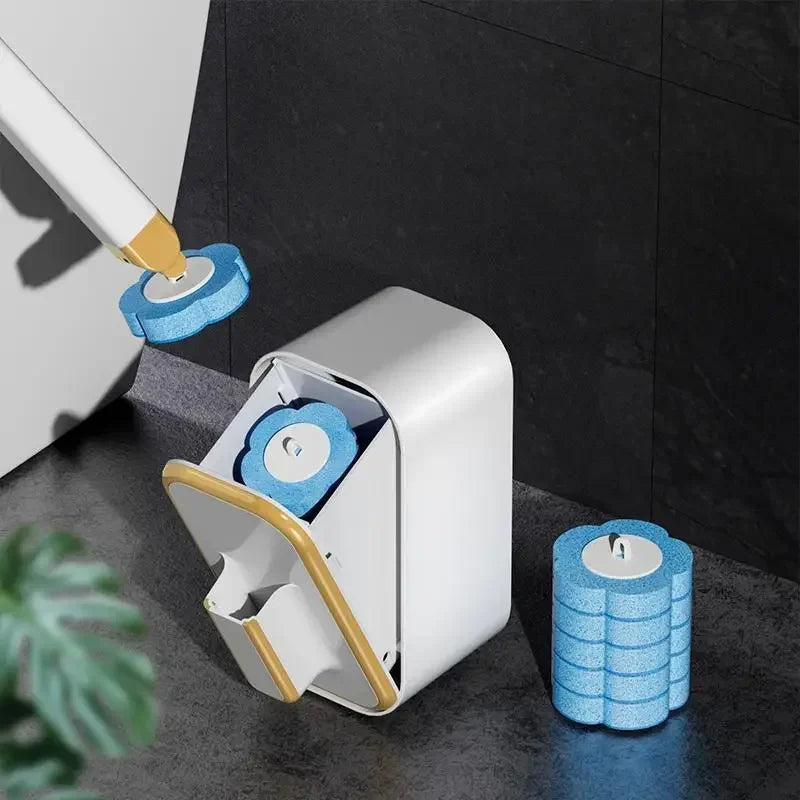 A white disposable toilet cleaning brush is shown next to a roll of blue cleaning wipes on a dark surface.