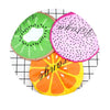 Three reusable fruit shower caps featuring kiwi, strawberry, and orange designs on a white background.