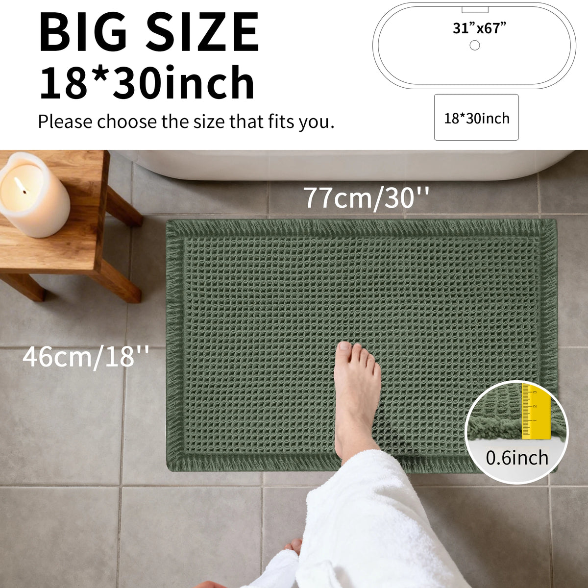 A close-up of a green waffle weave non-slip bathroom rug being used by a person's foot on a tiled floor.