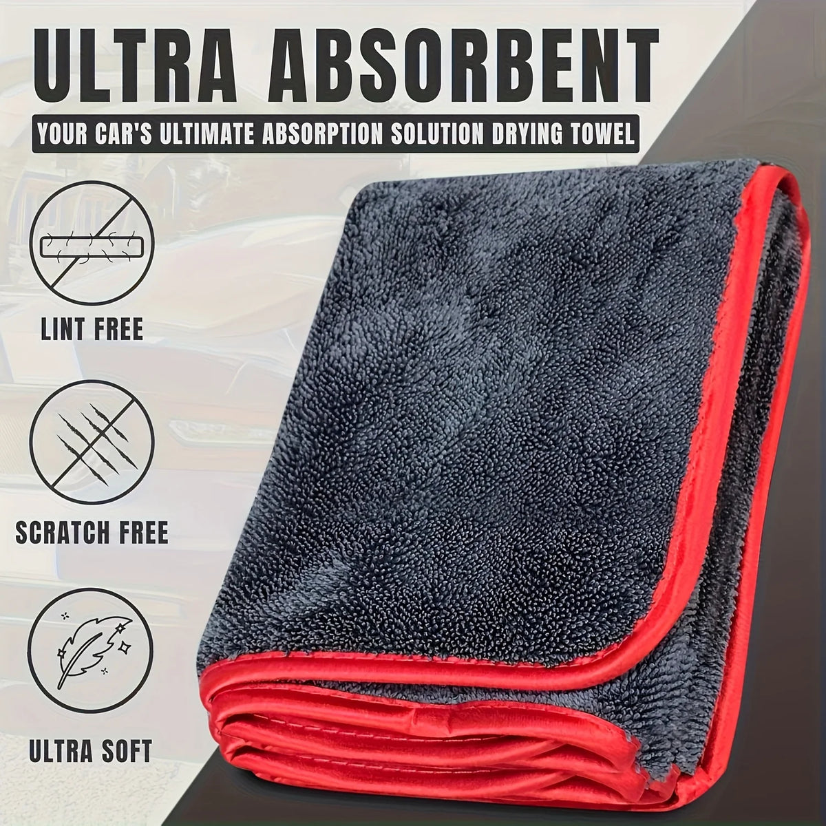 A dark gray and red microfiber car drying towel is shown rolled up, emphasizing its ultra absorbent and scratch-free features