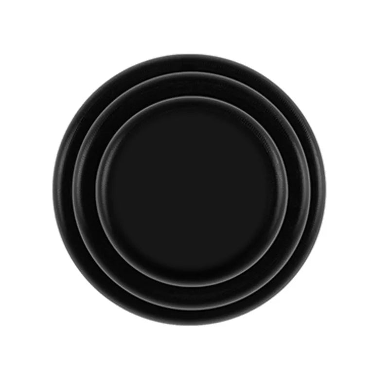 A stack of black car door anti-collision gaskets or seals.
