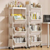 A white multi-layer portable storage rack with drawers and shelves is shown on a floor.