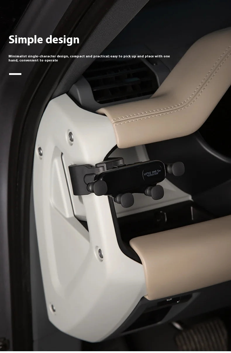 A close-up view of a beige magnetic car phone mount installed in a vehicle interior.