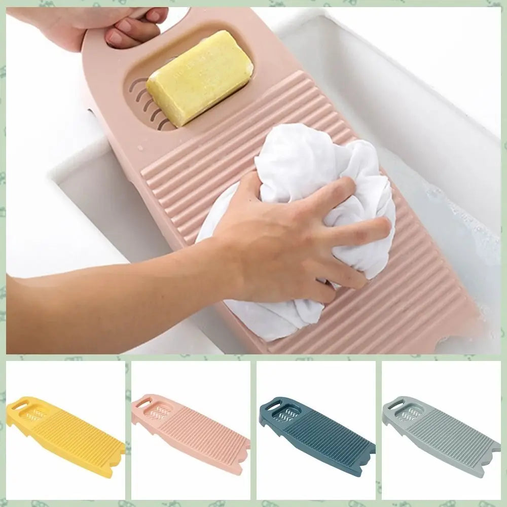 A set of durable plastic washing boards in yellow, pink, blue, and gray are shown.