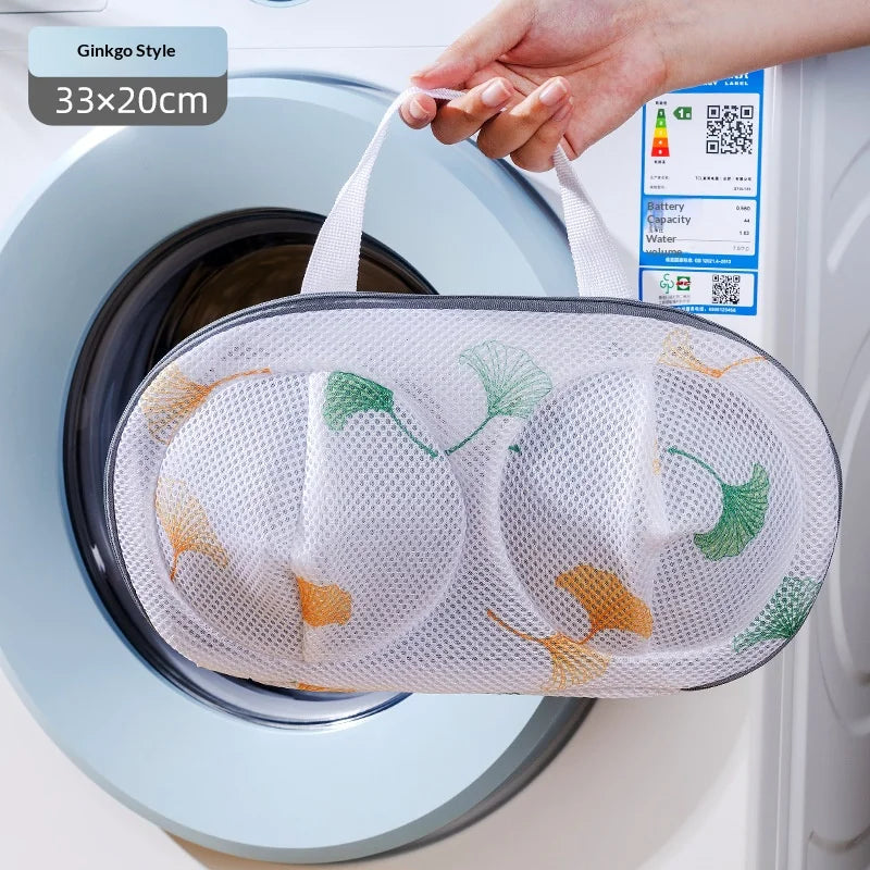 A white mesh laundry bag is shown inside a washing machine drum, ready for use.