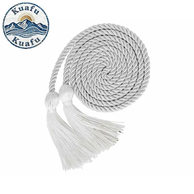 White graduation honor cord with tassel ends coiled for display