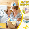A woman and a child are using reusable shoe cleaning bags in a laundry basket next to a washing machine.