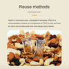 A close-up of orange food desiccant silica bags mixed with various nuts and dried fruits.