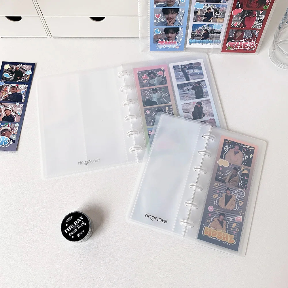 A collection of clear photo booth frames featuring wedding photos arranged on a white surface.