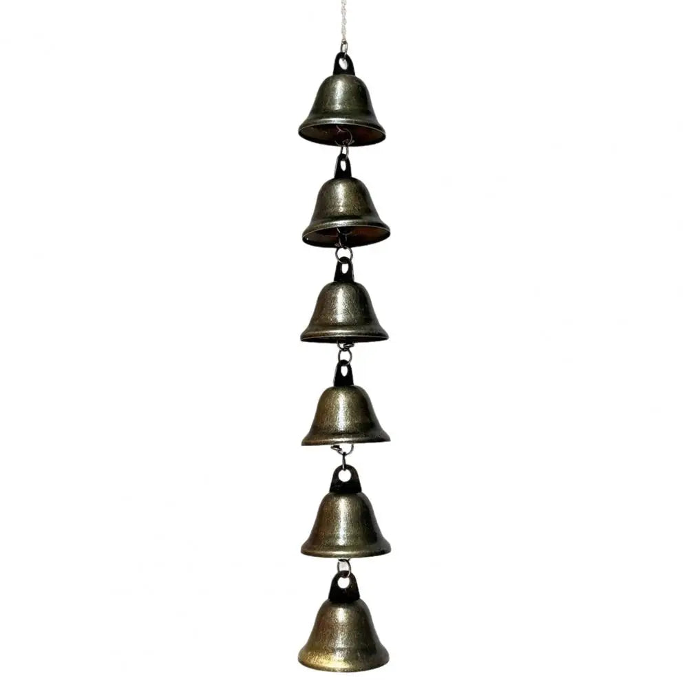 A hanging vintage metal wind chime decoration with multiple small bells.