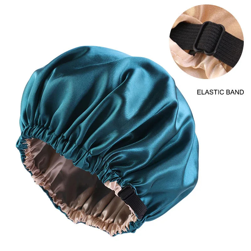 A teal satin sleep cap with an elastic band, shown from above and side view.