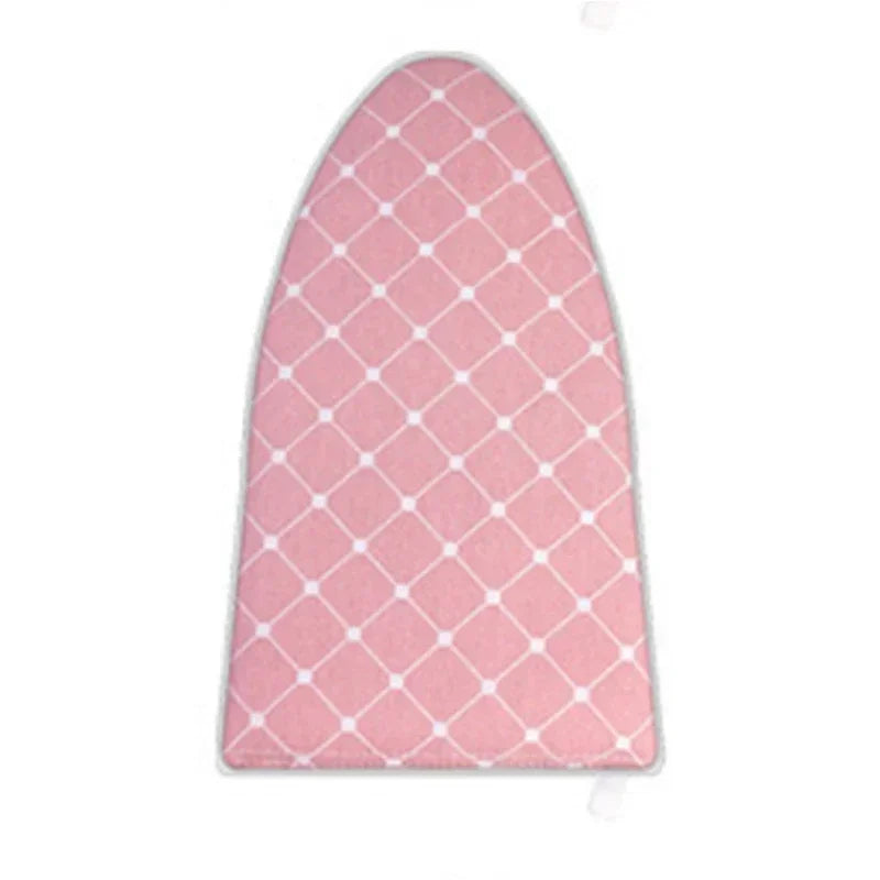 Pink quilted ironing board for portable hand-held garment steaming