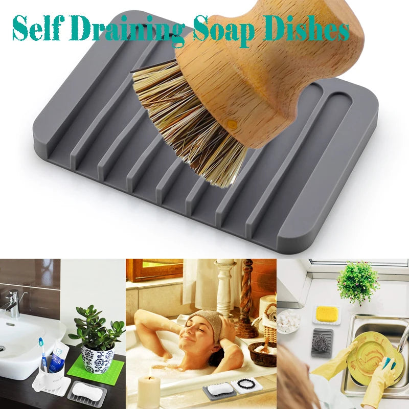 A set of two bamboo dish scrubbing brushes with sisal bristles resting on a gray silicone dish drying mat.