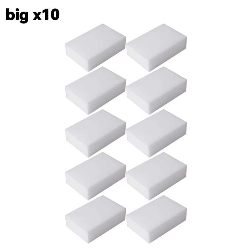 Ten white melamine cleaning sponges or magic erasers arranged in a row.