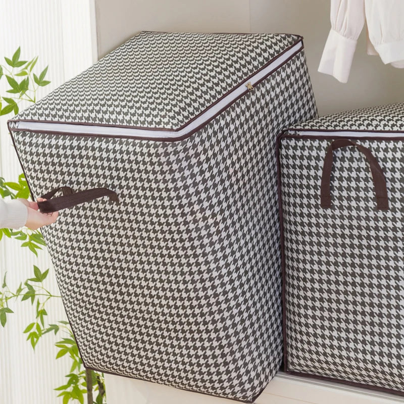 A patterned fabric foldable clothing storage bag is shown next to an open version.