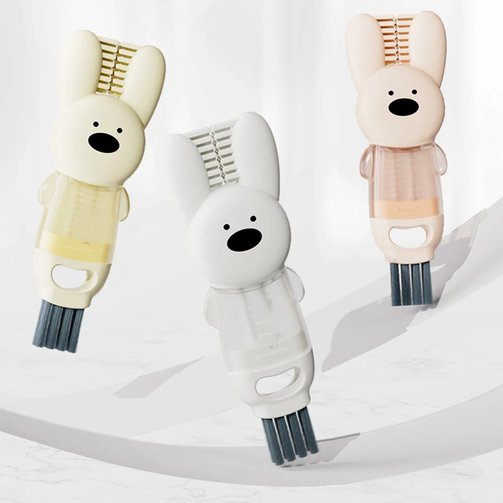 A set of three pink and white silicone cleaning brushes for portable cup and bottle cleaning