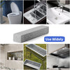 A gray pumice stone cleaning stick is shown next to various bathroom and kitchen surfaces.