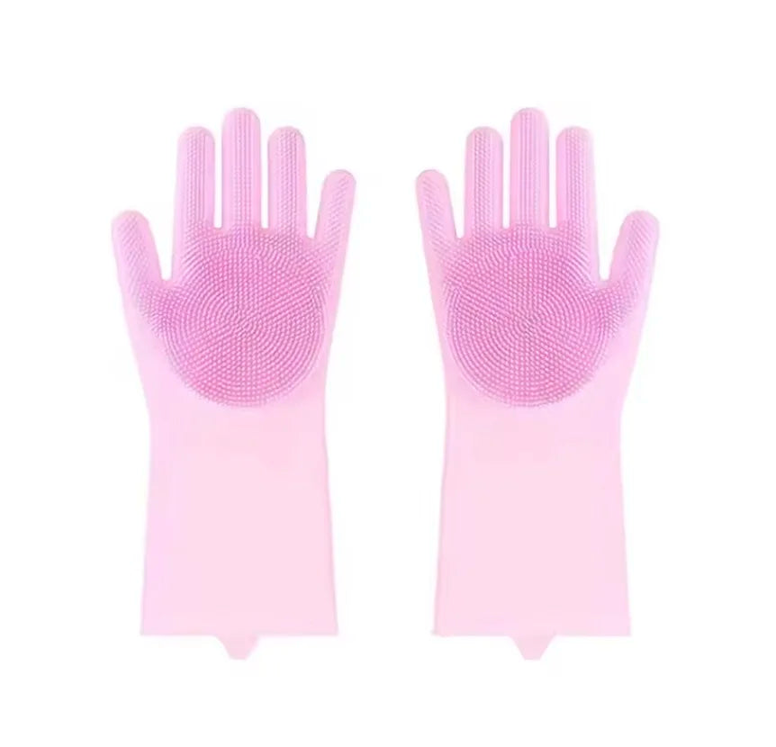 A pair of pink silicone dishwashing gloves with textured palms and fingers.