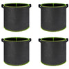 A set of black breathable fabric plant grow bags with green trim and sturdy handles.