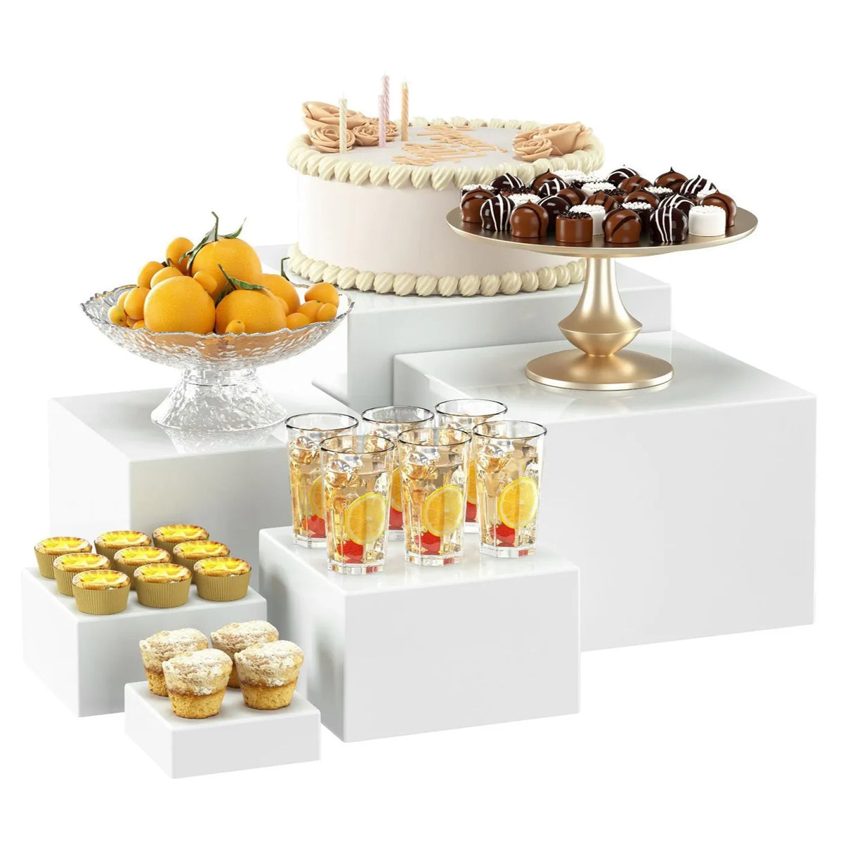 A tiered white acrylic buffet riser displaying various desserts and fruit