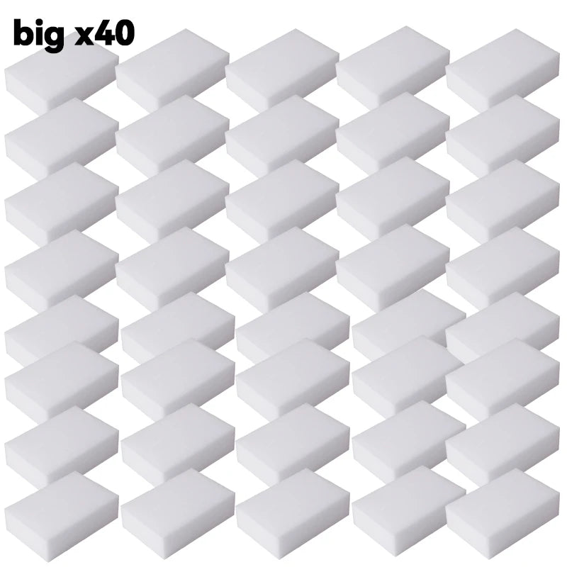A set of forty white melamine cleaning sponges or magic erasers.