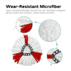 Close-up view of a white and red microfiber mop head with a black ring, showing the absorbent strands.