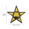 A black forged iron star hanging candlestick with a gold textured surface.