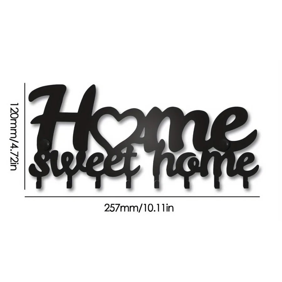 Black decorative metal key holder rack with heart-shaped hooks for keys and accessories