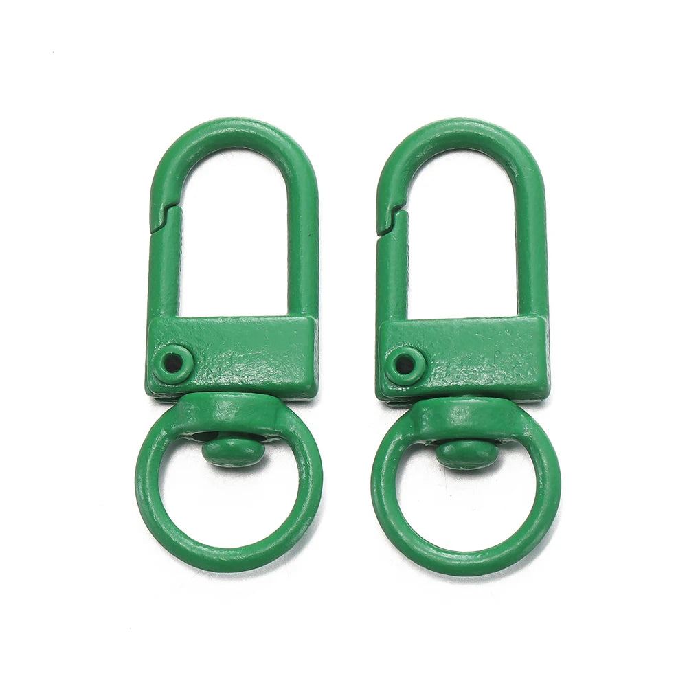 A pair of green alloy snap lobster clasp hooks for jewelry making