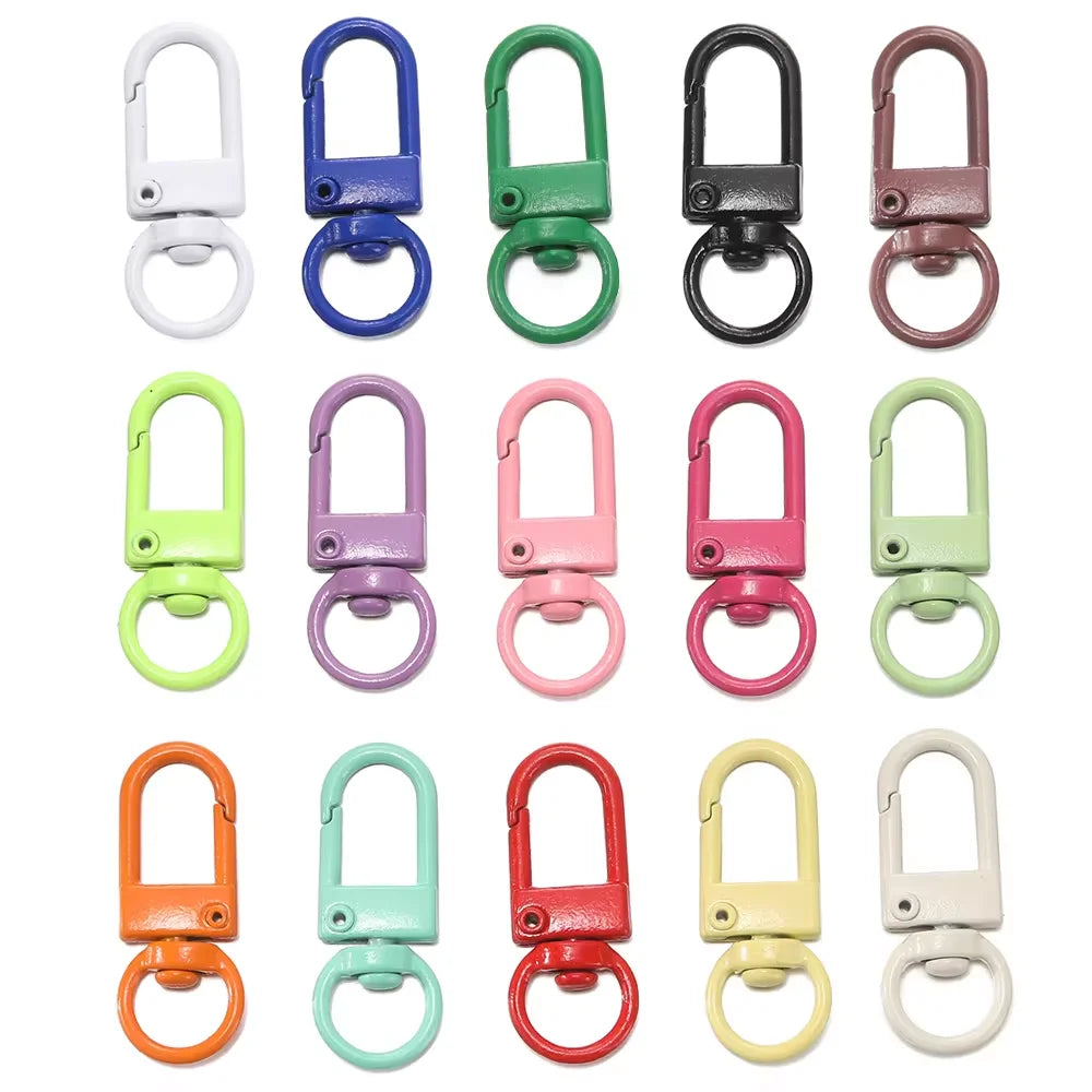 A collection of colorful alloy snap lobster clasp hooks for jewelry making in various colors like white, blue, green, pink, a