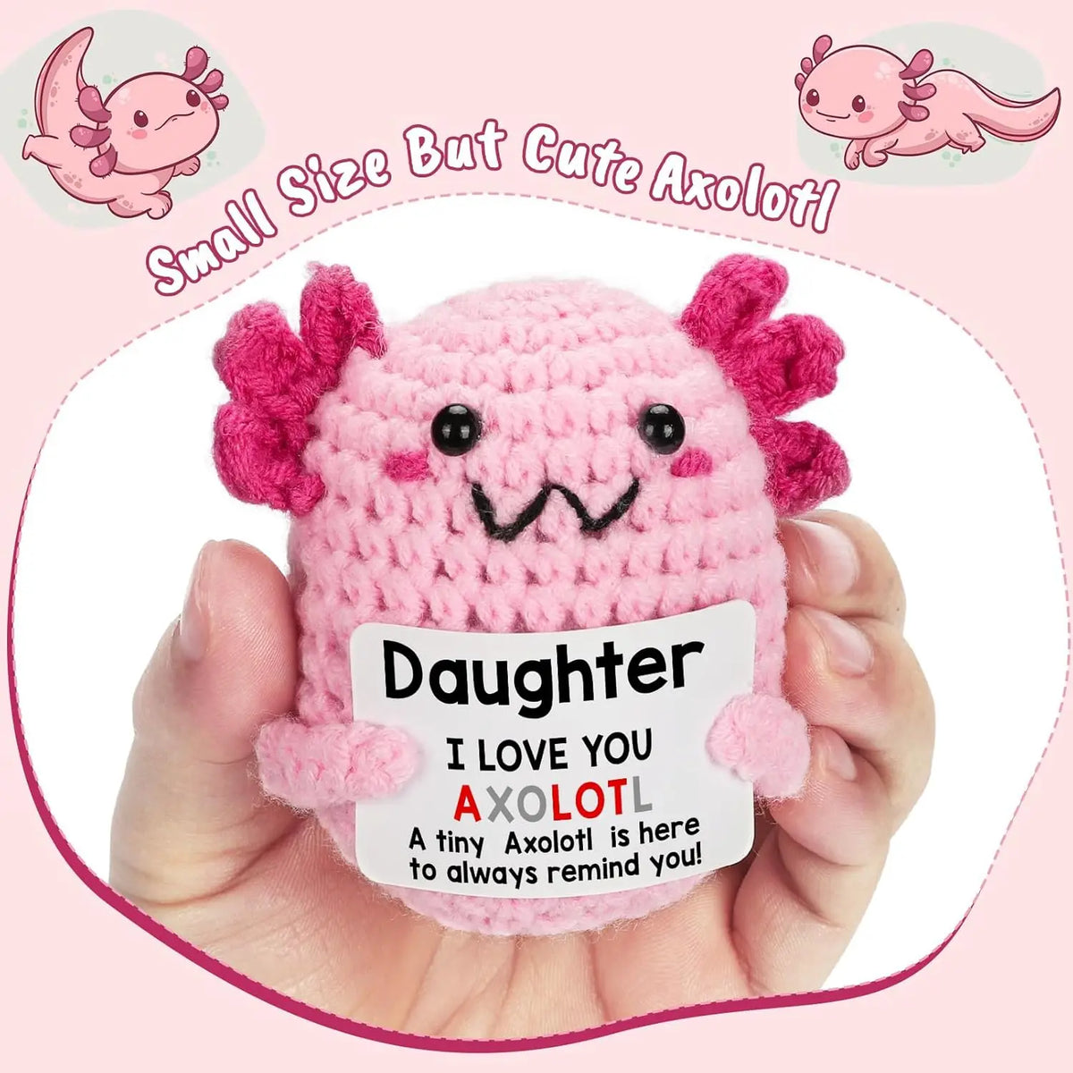 Handmade pink crochet axolotl figurine with a tag that reads I love you daughter