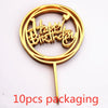 A gold acrylic birthday cake topper with the words Happy Birthday on a stick, packaged in 10 pieces.
