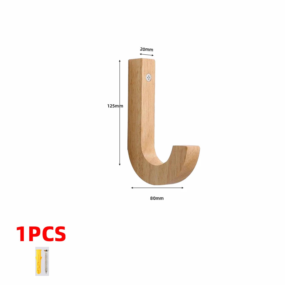 A natural oak wood wall hook shaped like a letter U with a screw for hanging.