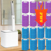 A set of purple and blue disposable toilet brush refills with long handles and wall mounts displayed on a counter.