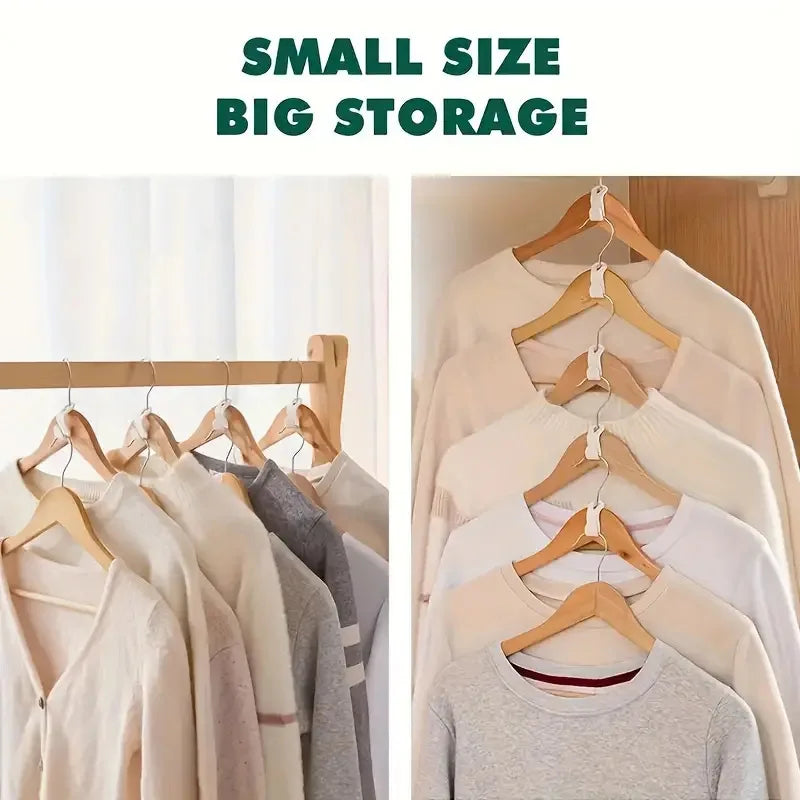 A collection of light-colored knit sweaters and shirts hanging on wooden clothes hangers for wardrobe organization.