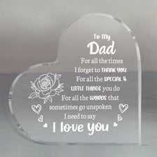 A clear acrylic heart-shaped keepsake engraved with the message To my Dad For all the times I forget to thank you For all the