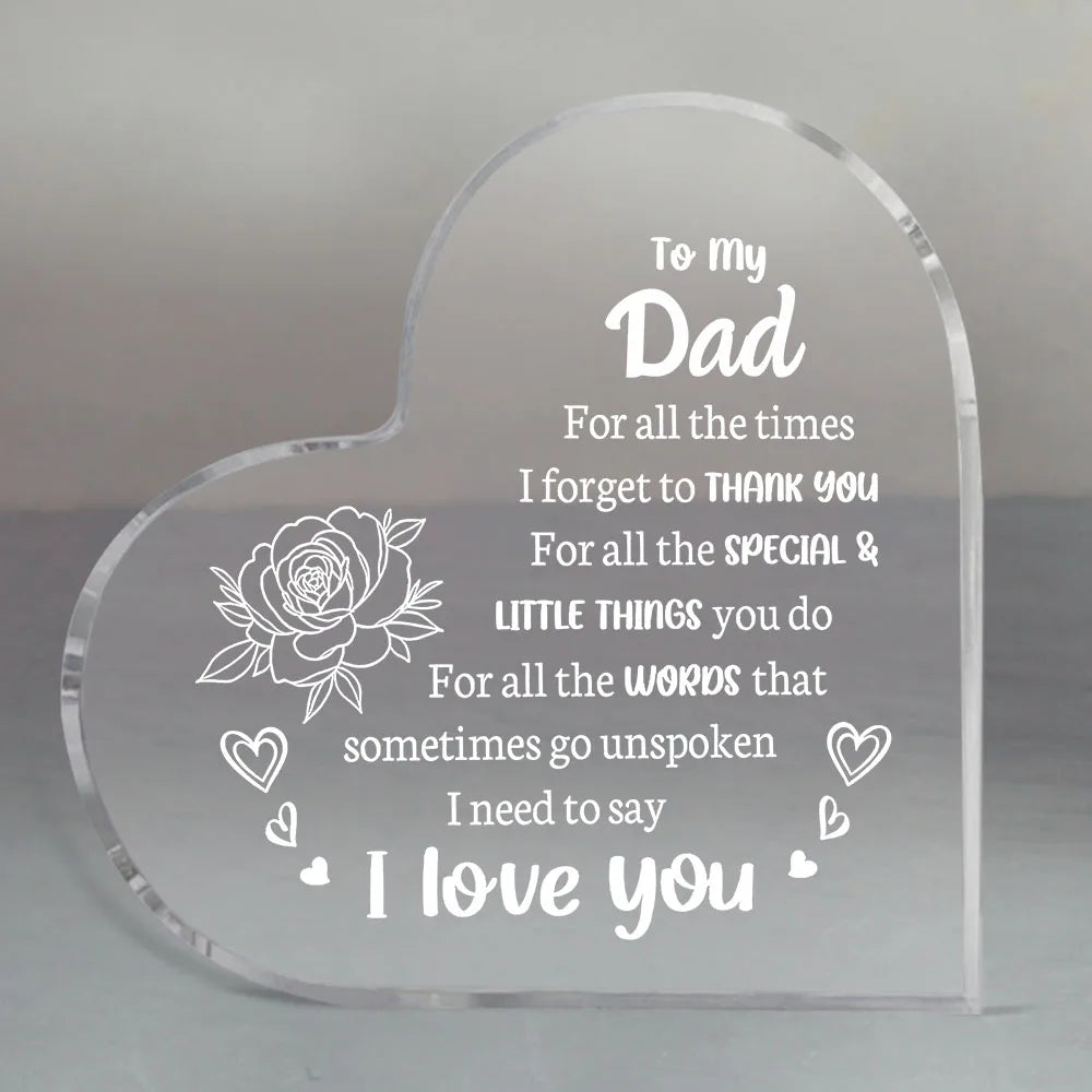 A clear acrylic heart-shaped keepsake engraved with the message To my Dad For all the times I forget to thank you For all the