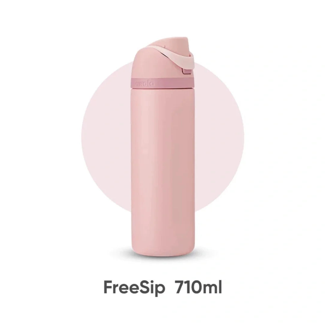 A pink FreeSip 710ml water bottle with a pink lid is shown against a light background.