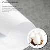 A close-up view of white cotton canvas fabric texture and fluffy white fibers.