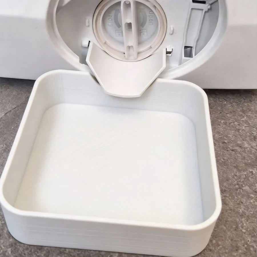 Bandeja y embudo de drenaje para lavadora pesada blanca con tapa extraíble.