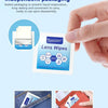 A hand holds a package of Powerclean Lens Wipes, showing the product packaging and usage context.