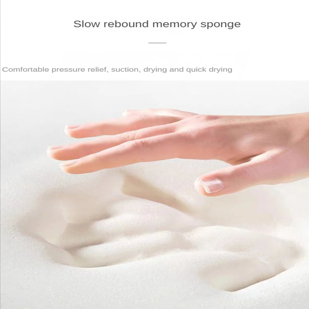 A hand is pressing into a white, porous sponge material to demonstrate its slow rebound and pressure relief.