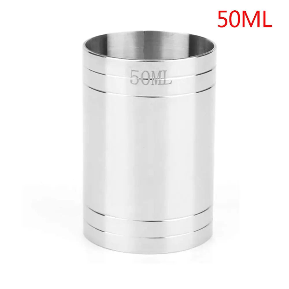A silver stainless steel bar measure with a 50ML capacity marking.