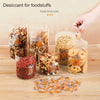 Various food desiccants in glass bags including dried fruit nuts and grains for moisture control
