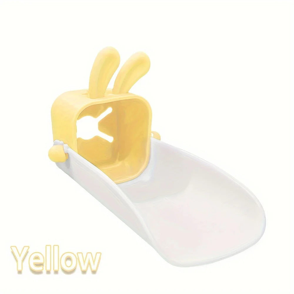 Yellow anti-splash faucet extender with a cute rabbit design.