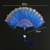 A bright blue lace fabric folding hand fan with a feathered edge and tassel.