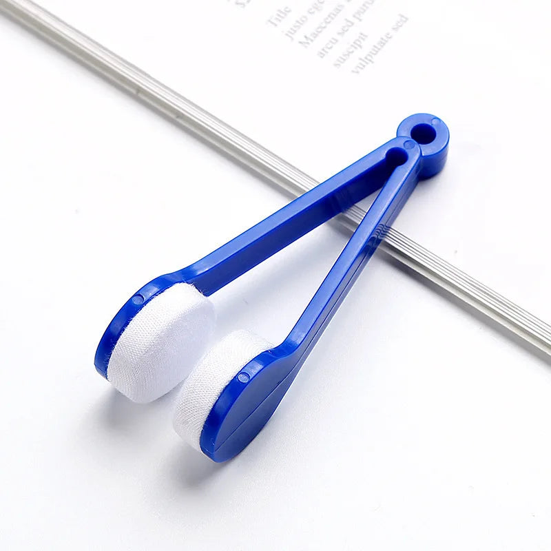 Blue and white multifunctional tool for cleaning eyeglasses